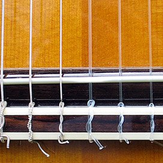 Как поставить нейлоновые струны на гитару