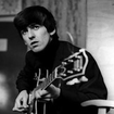 Пока моя гитара тихо плачет (While My Guitar Gently Weeps)